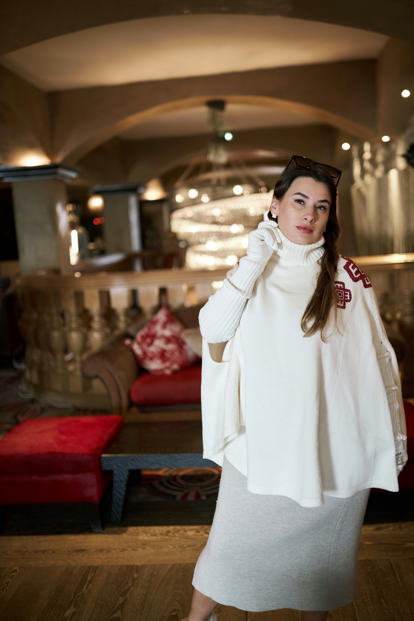 White poncho with ornament