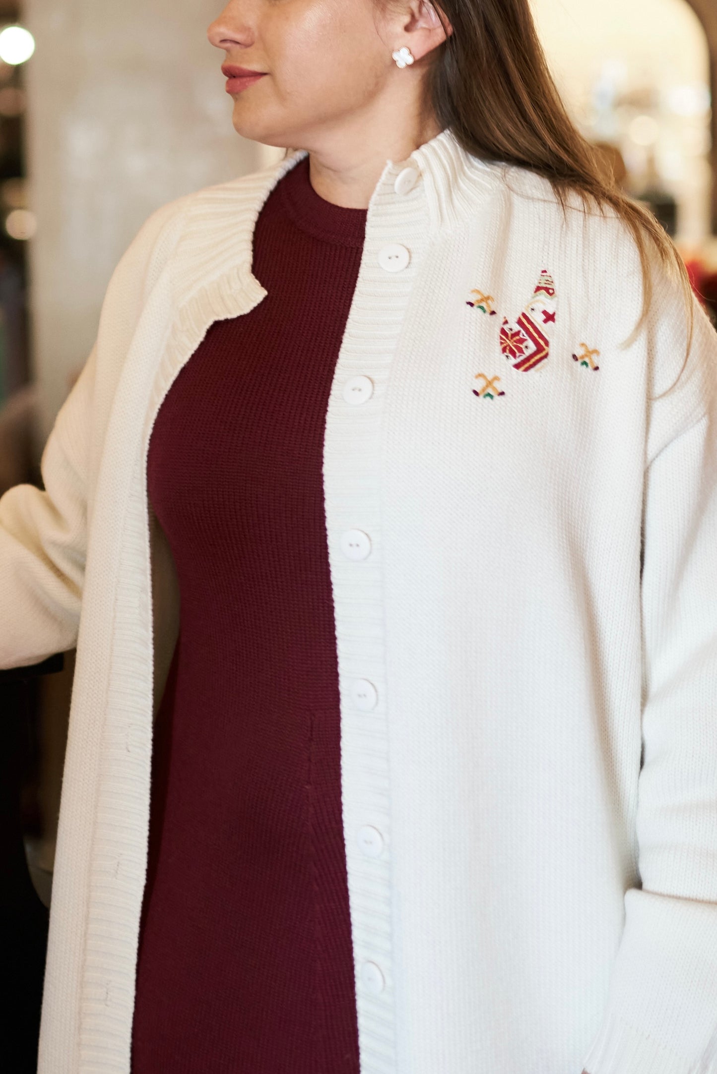 White cardigan with woman